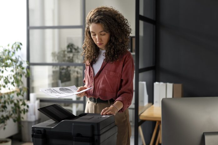 medium-shot-woman-using-printer1